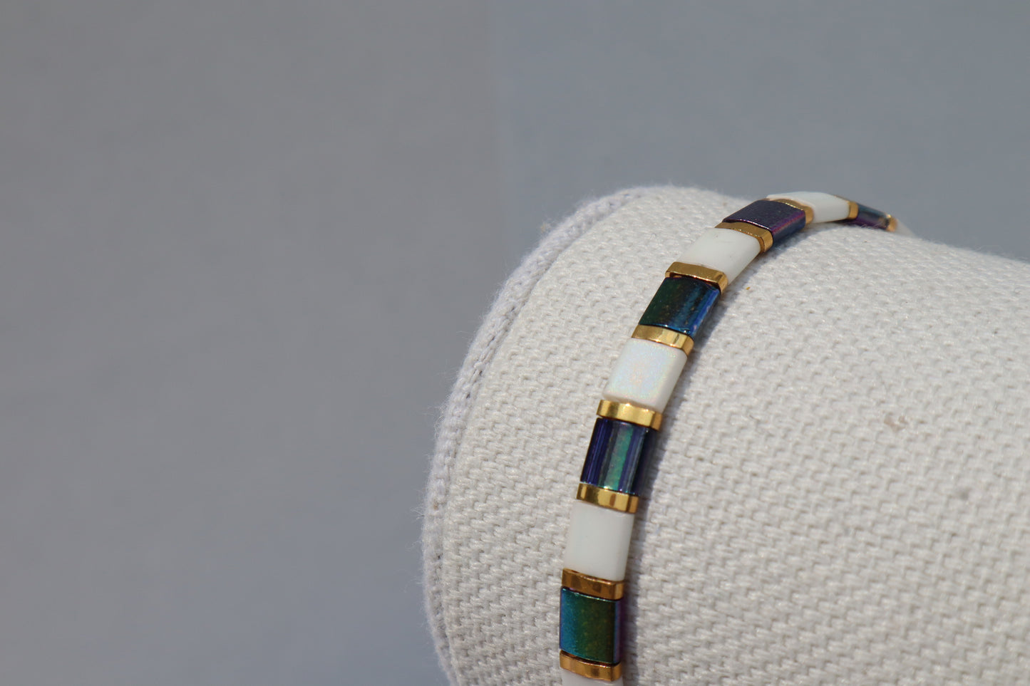Magic Blue and Matte White AB Straight Tila Bead Bracelet with 24kt gold Accent beads