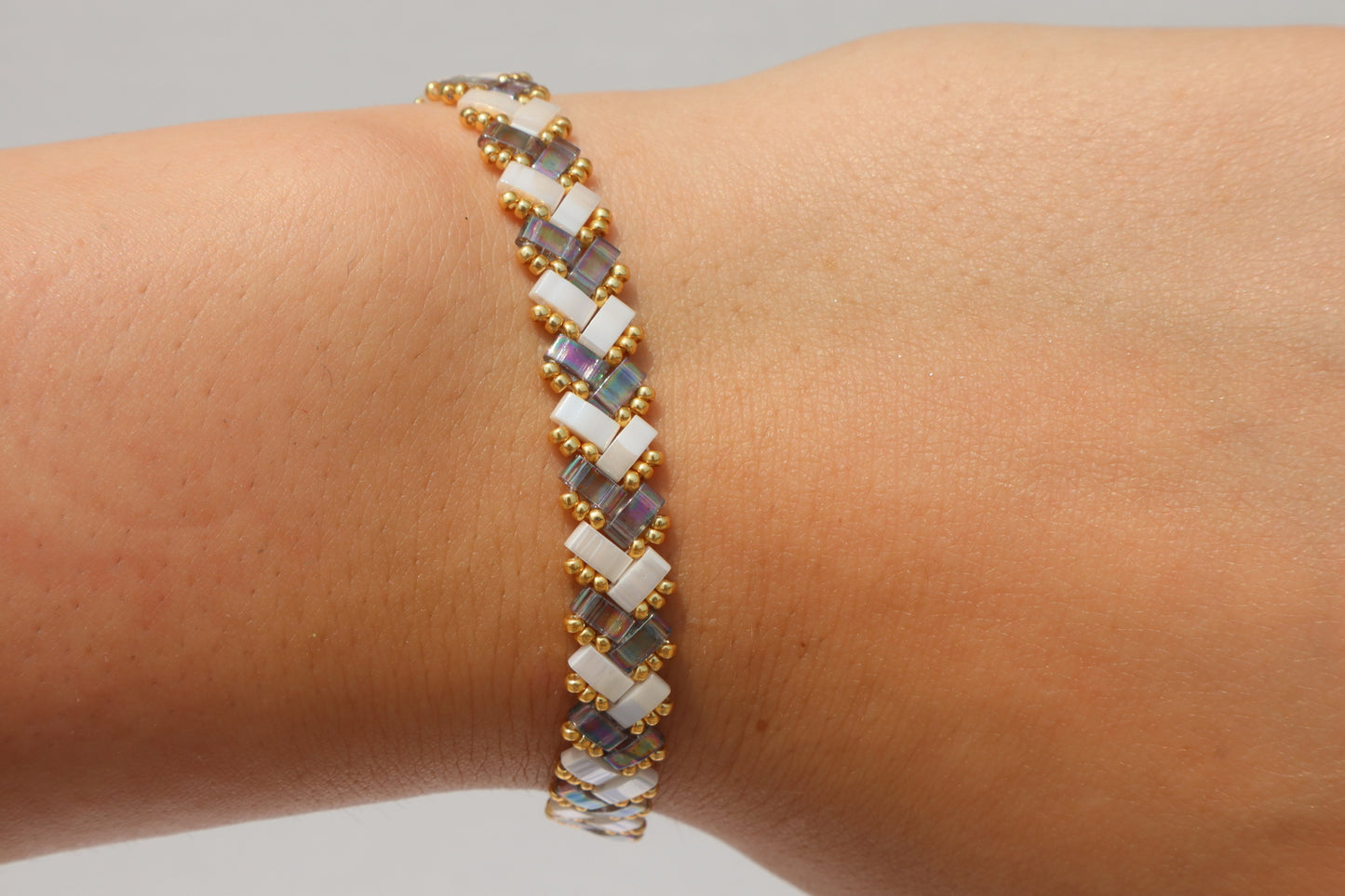 Blue/ Grey Luster and Creme White Braided Tila Bracelet