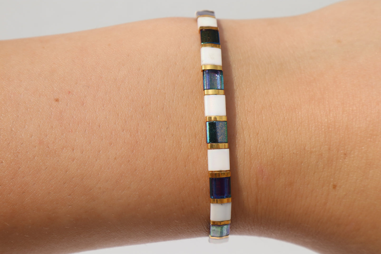 Magic Blue and Matte White AB Straight Tila Bead Bracelet with 24kt gold Accent beads