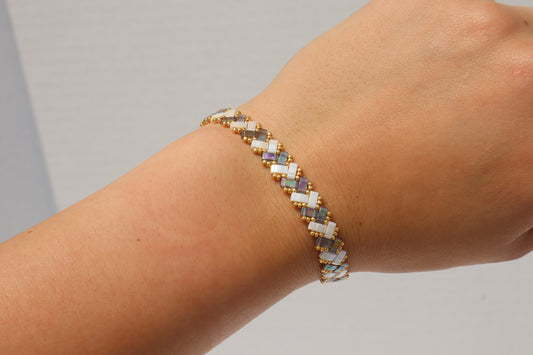 Blue/ Grey Luster and Creme White Braided Tila Bracelet